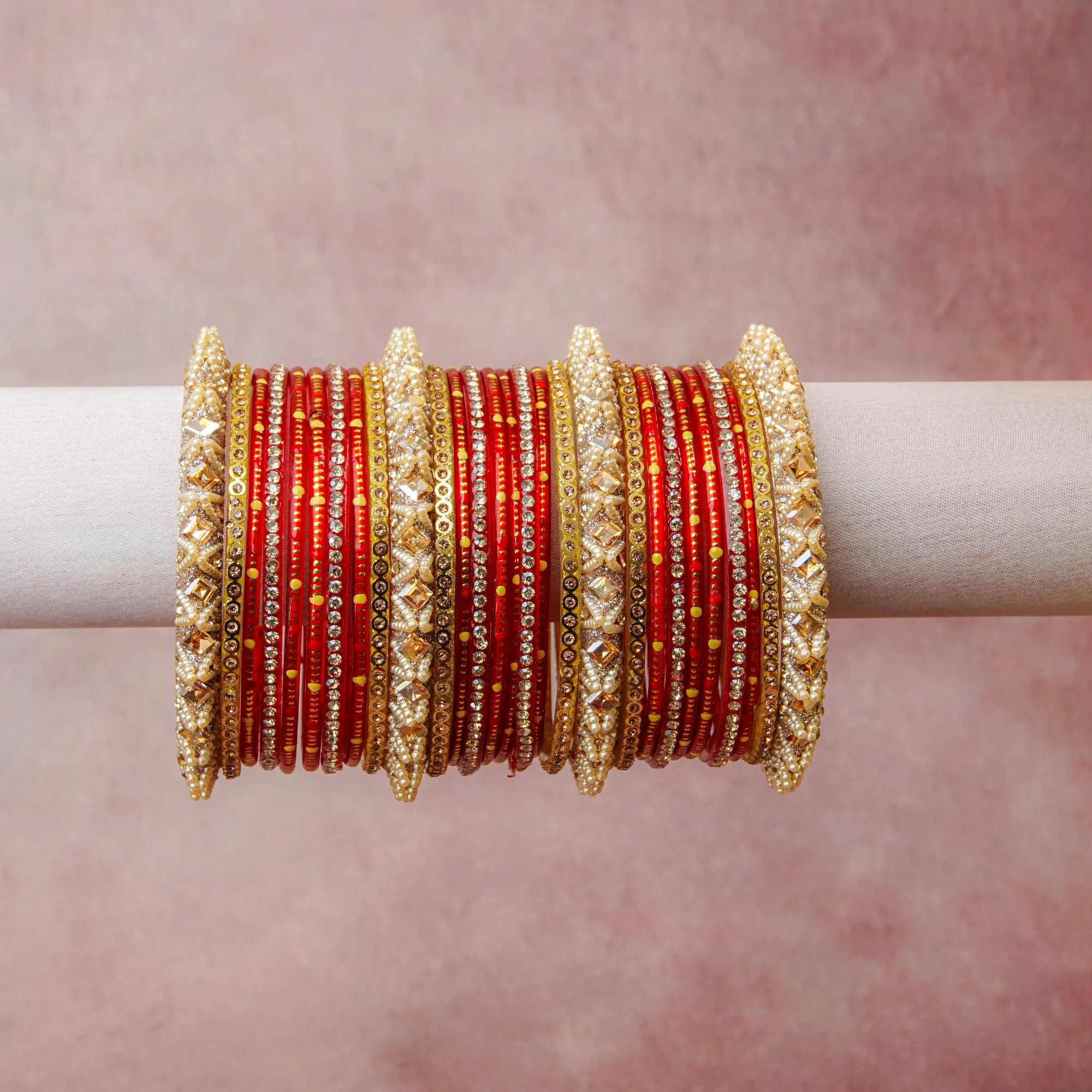 A grounding Deep Vermilion forms the heart of the set, while touches of Metallic Gold, Creamy Pearl, Clear Faceted Crystal add charm.

A thoughtful composition of Glass, Metal Alloy (Gold-toned), Simulated Pearls, Rhinestone, designed to feel complete without being heavy.
Each element layers seamlessly, creating a look that is refined, wearable and quietly striking.